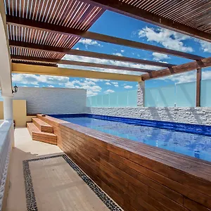 https://hostal-benjamin-playa-del-carmen.quintano-roohotels.com
